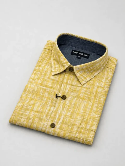 Men's Mustard Yellow Long Sleeve Shirt with White Abstract Leaf Print.